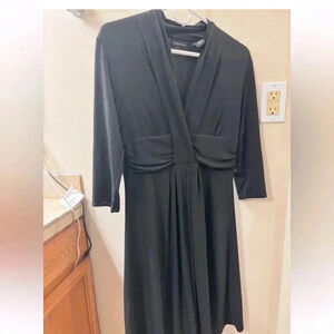 NY and Company flattering black dress. Size Medium.
